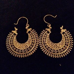 Ornate gold tone hoops